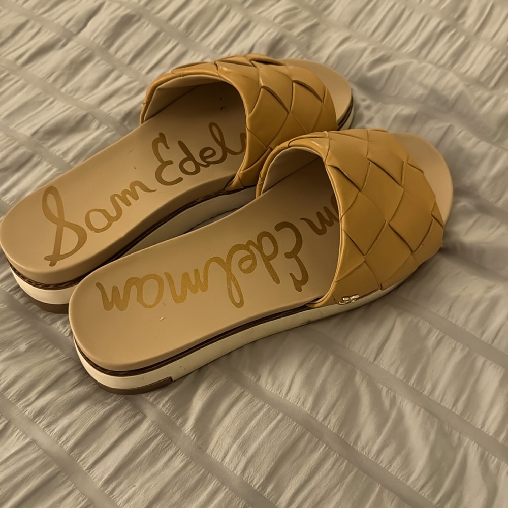Beautiful size 7 (runs a little big) luxury slides.  Worn twice.